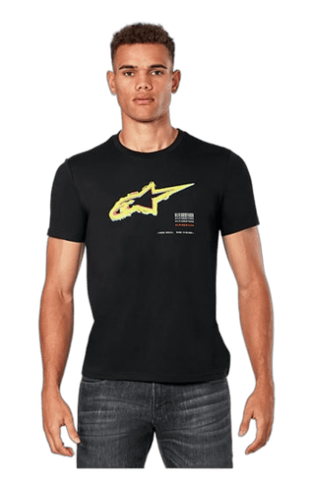 Young man wearing a black Grand Prix Racewear T-shirt with a yellow and white logo, standing against a plain background.