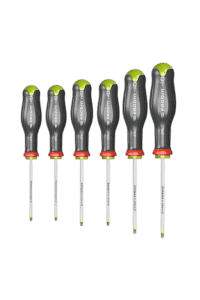 Set of six Facom screwdrivers with black handles and green accents, arranged in order of size for professional use.