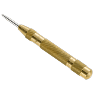 Close-up of a gold-toned automatic centre punch tool with textured grip for precision marking.