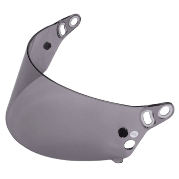 Close-up of a grey motorcycle helmet visor with ventilation holes, designed for racing safety and performance.