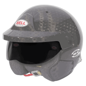 Bell racing helmet with carbon fibre finish, designed for motorsport safety and performance, featuring a visor and aerodynamic shape.