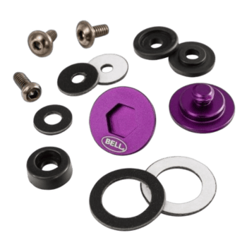 Set of racing helmet accessories including screws, washers, and purple anodised components for Grand Prix Racewear.