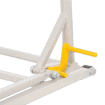 Close-up of a white racing simulator frame with a yellow adjustment lever for Grand Prix Racewear.