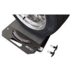 Race car wheel on a professional tyre balancing machine for optimal performance and safety.