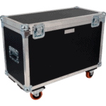Heavy-duty black flight case with metal reinforcements and orange caster wheels, used for transporting racing equipment or gear.