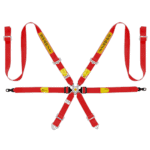 Sabelt silver enduro racing harness with red straps and yellow branding for motorsport safety.