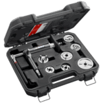 Facom pneumatic disc brake piston pushing and turning tool set in a black case with various attachments for brake maintenance.