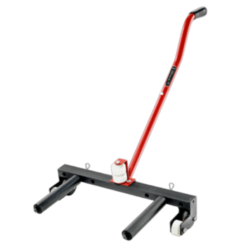 Heavy-duty wheel lift device with red handle and black base for vehicle recovery and transport.