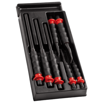 Set of Facom drift punches and chisels in a black plastic case, designed for precision metalworking and automotive tasks.
