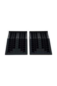 Two black racing car pit stop mats with hexagonal and rectangular patterns for Grand Prix Racewear.