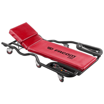 Facom heavy-duty inspection creeper with red padded surface and black frame, designed for automotive inspection and repair.