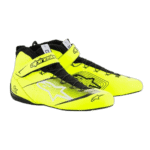 Bright yellow Alpinestars racing shoes with black accents and adjustable strap, designed for motorsport enthusiasts and professional racers.