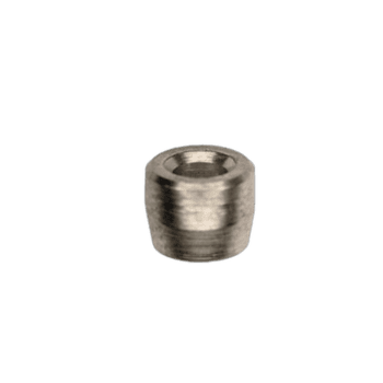 Close-up of a small metallic fitting or connector, possibly used in racing or automotive applications.