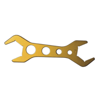 Close-up of a gold-coloured double alloy spanner with multiple hole sizes for versatile use.