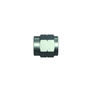 Close-up of a metal tube nut used in high-performance racing fuel and oil systems, suitable for Grand Prix Racewear applications.
