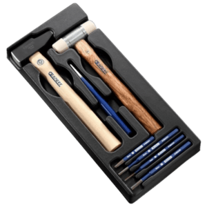Set of 7 shock tools with wooden and plastic handles in a black foam insert for precise automotive repairs.