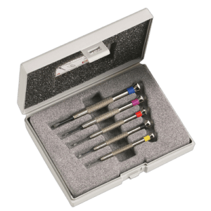 Set of six precision watchmaker screwdrivers with coloured caps in a grey plastic case for slotted head screws.