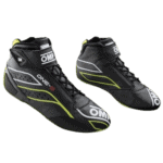 Black racing shoes with yellow and white accents from Grand Prix Racewear, designed for motorsport enthusiasts and professional drivers.
