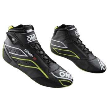Black racing shoes with yellow and white accents from Grand Prix Racewear, designed for motorsport enthusiasts and professional drivers.