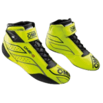 Bright yellow OMP Grand Prix racing shoes with black accents, designed for motorsport safety and performance.