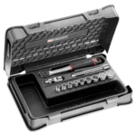 Facom 12-piece 3/8 inch 12-point socket set in a durable black case with various sockets and tools for automotive and mechanical work.