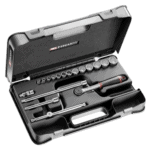 Facom 12-piece 3/8 inch 19-point socket set in a black case with various sockets and tools for automotive and mechanical work.