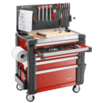 Facom tool chest with wooden worktop, containing various hand tools and accessories, on a mobile cart for workshop use.