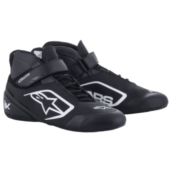 Black Grand Prix racing shoes with white logo and Velcro strap, designed for motorsport enthusiasts and professional drivers.