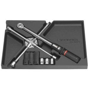 Grand Prix Racewear torque wrench set with sockets and accessories in a foam case for precise wheel nut tightening.