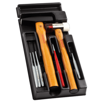 Set of Facom impact tools including hammers and chisels in a black case, suitable for professional impact work.