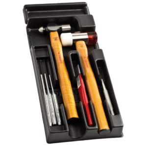 Set of Facom impact tools including hammers and chisels in a black carrying case, ideal for professional automotive and mechanical work.