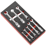 Facom inch hinged ratchet combination wrench set in foam module for professional automotive and mechanical use.