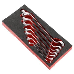 Set of Facom 7-piece inch and metric angled offset-ring wrenches in foam tray for professional automotive repair.