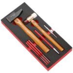 Facom impact tools set with hammer, chisel, and accessories in a foam-lined box for professional use.