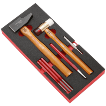Facom impact tools set with hammer, chisel, and accessories in a foam-lined box for professional use.