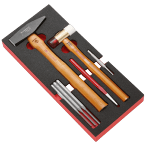 Facom impact tools set with hammer, chisel, and accessories in a black and red foam case for professional use.