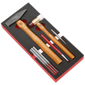 Facom impact tools set with hammer, chisel, and accessories in a black and red foam case for professional use.