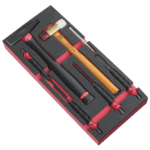 Facom impact tools set with long sheathed drift punches and foam module for precision work.