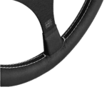 Close-up of a black racing steering wheel with white stitching, designed for motorsport performance and durability.