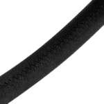 Close-up of a black racing grip with textured surface and detailed stitching, designed for motorsport safety and control.