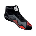 High-performance racing shoe from Grand Prix Racewear with black, grey, and red design, featuring advanced grip and support for motorsport drivers.