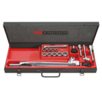 Facom R-J-S.205E modular socket set with various sockets and tools in a black and red case.