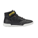 Black Sabelt racing shoe with yellow logo and white sole, designed for motorsport safety and performance.