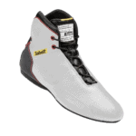Sabelt racing shoe with white, black, and red design, featuring laces and branding for motorsport safety gear.