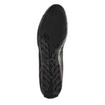Black Sabelt racing shoe sole with textured grip and branding for motorsport safety gear.