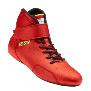 Red Sabelt racing shoe with black laces and ankle support, designed for motorsport safety and performance.