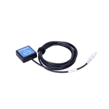 Racewear safety sensor device with coiled cable and blue control box for Grand Prix racing.