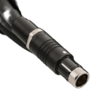 Close-up of a professional XLR microphone connector used in racing event audio setups.