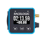 Racelogic racing data logger with digital display showing 2:13.59 time and plus 00.00, used for motorsport timing and analysis.