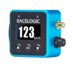Racelogic GPS data logger for motorsport with digital display showing 123 km/h, compact blue device with connectors for vehicle installation.
